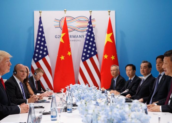 Trump en una reunión con Xi Jinping en Alemania.