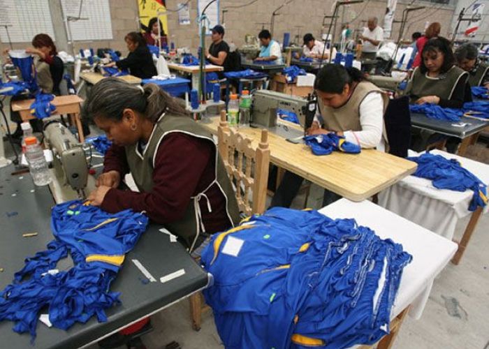 Trabajadores textiles.